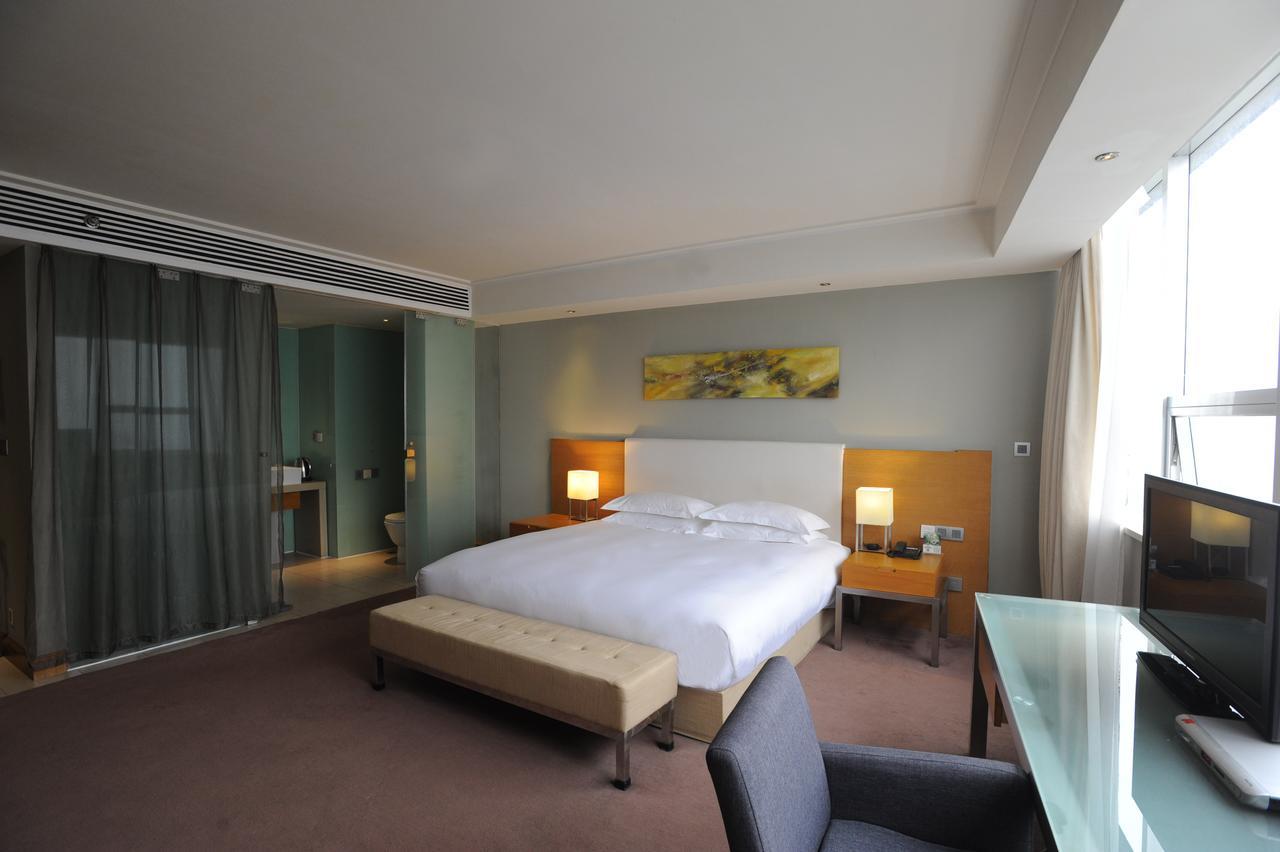 Tang'S Hotel تشانغده المظهر الخارجي الصورة