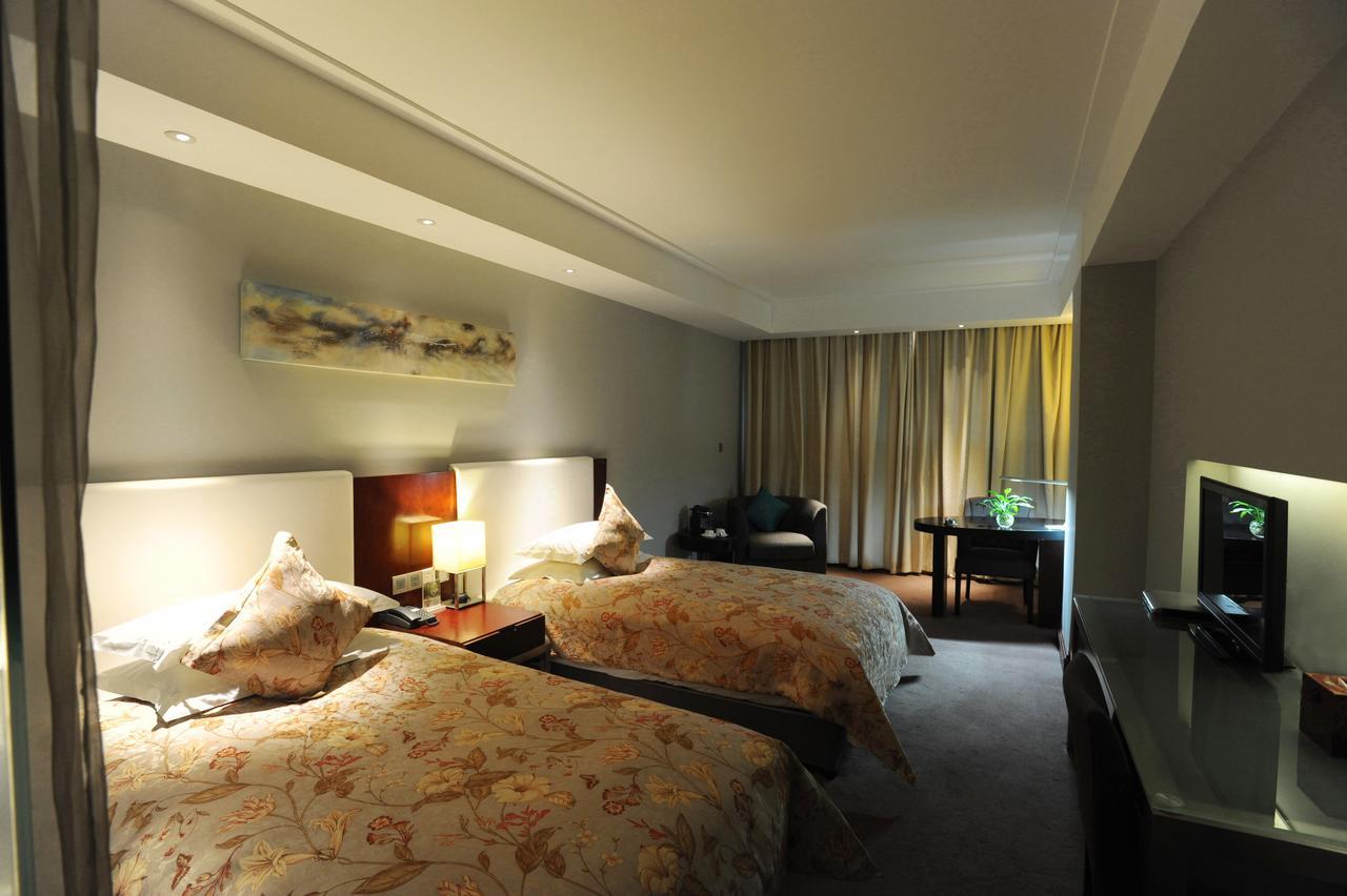 Tang'S Hotel تشانغده المظهر الخارجي الصورة