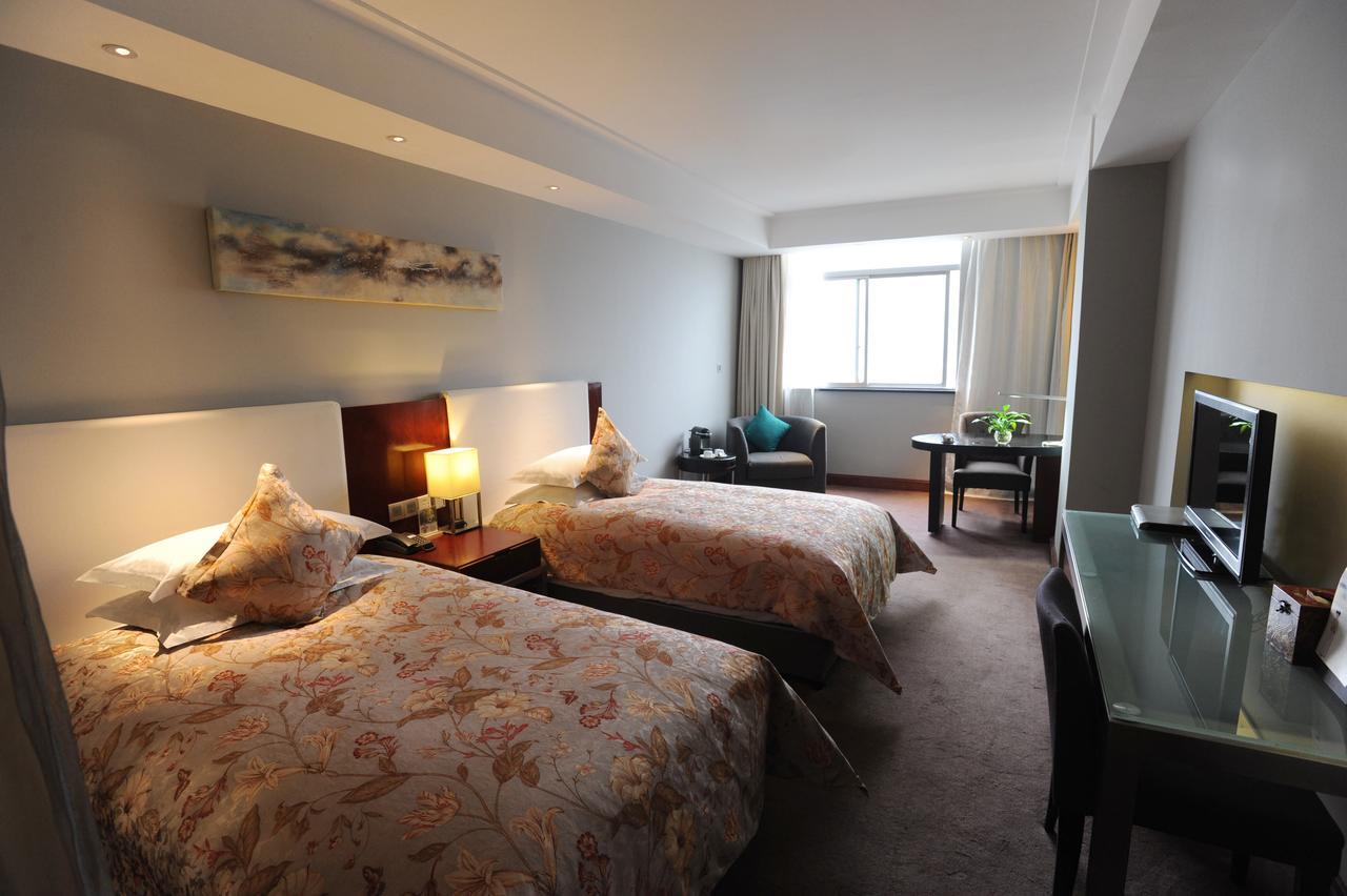 Tang'S Hotel تشانغده المظهر الخارجي الصورة